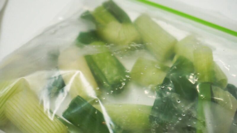 Leeks in Plastic Container